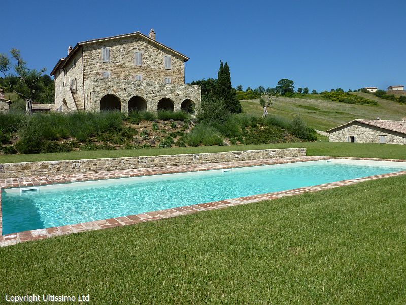 The San Vittorino swimming pool, grounds and villa