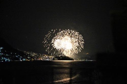 Fireworks over Sala Comacina at night on Lake Como
