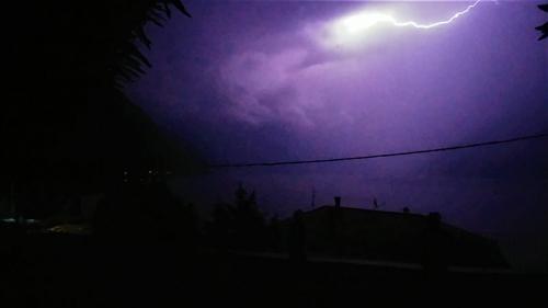 Lightning over Lake Como at night